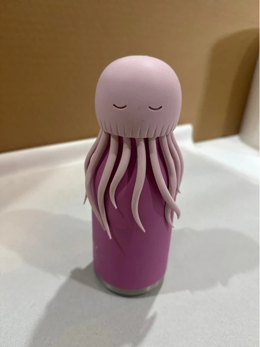 an asobu Bestie Water Bottle in the pink jellyfish design16 oz